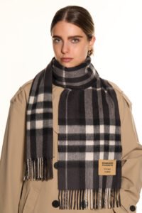 A young woman and her mother both wearing Scott Cashmere scarves, showcasing timeless fashion across generations.